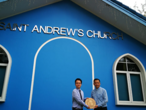 Alex Song and Rev Johnny with the first marker in Brunei