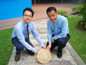 Alex Song and Rev Johnny with the first marker in Brunei